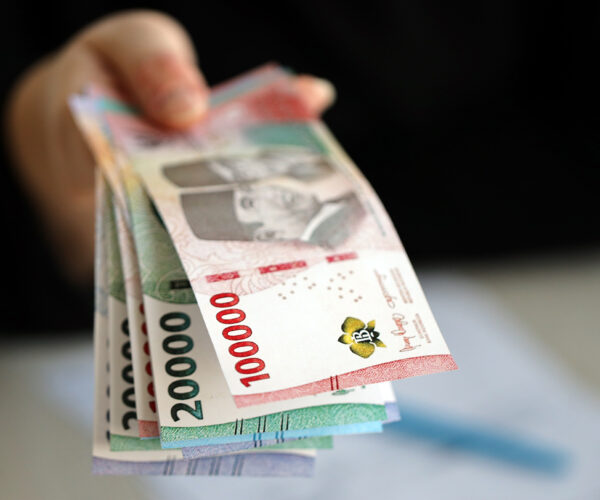 Female accountant hand Indonesian Rupiah Money Indonesian Rupiah Money